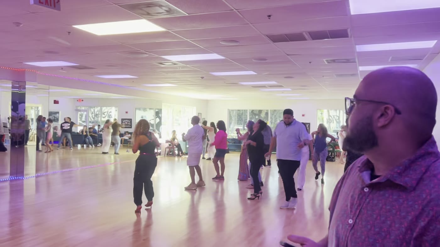 Dancers on the floor at a Muévete Parties Latin night
